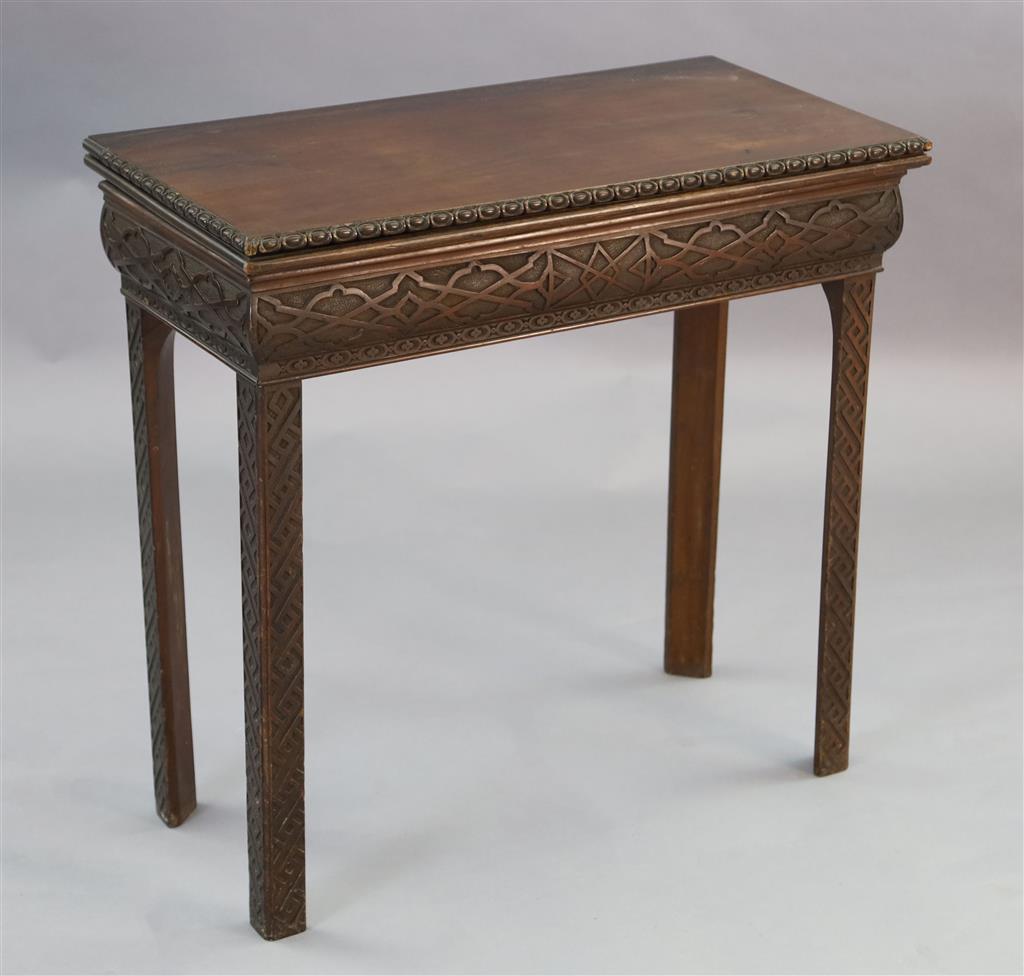 A George III mahogany card table, W.2ft 5in. D.1ft 3in. H.2ft 4in.